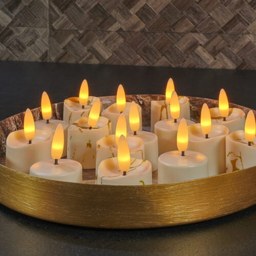 verschillende soorten led kaarsjes op een goud kleurig dienblad